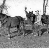 Early Photo of Two men with horses and cart. Identity and date unknown