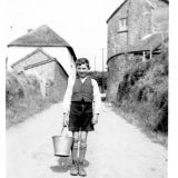 WW Jack Yendell getting water from well prior to mains drainage 1940s.jpg