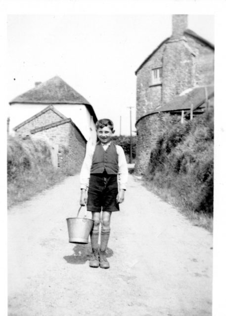 WW Jack Yendell getting water from well prior to mains drainage 1940s.jpg