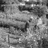 Alan Tanner at Knights Cottage talking to  Rosemary Webber